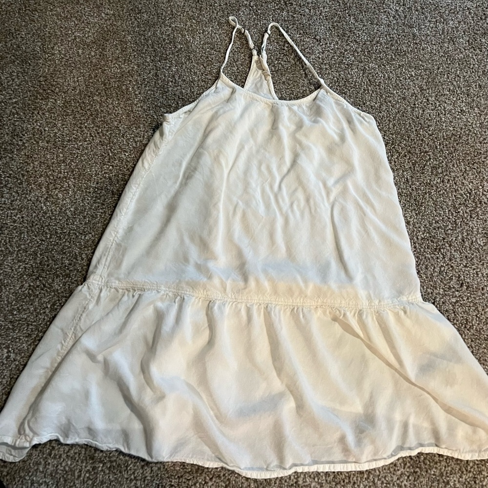 New without tags. White/Off-white Roxy dress or swimsuit cover up.
